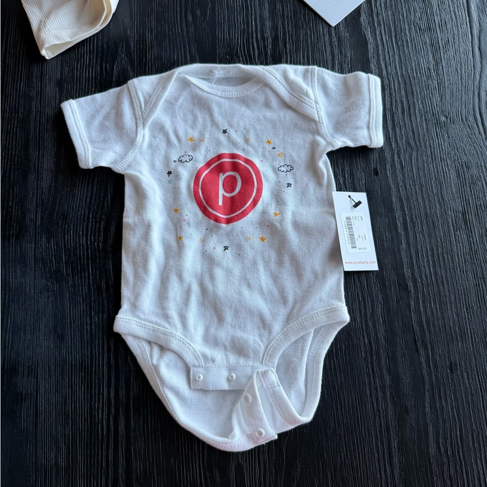 Pure Barre White Onesie with Red Accents